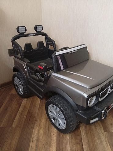 oyuncaq pultlu masin: Uşaq elektrik maşını – off-road tipli jeep Xüsusiyyətlər: - Korpus — 3