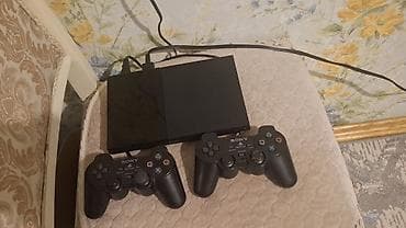 ps diskleri: Sony PlayStation 2 Slim (PS2) oyun konsolu - Model: PlayStation 2 — 2