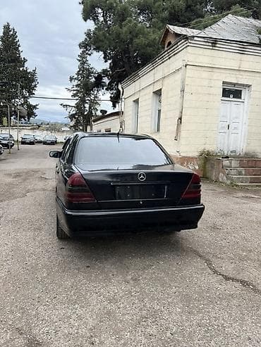 w210 arxa stoplar: Mercedes-Benz C 180: 1.8 l | 1997 il Sedan — 6
