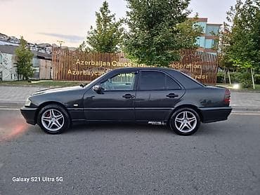 1994 bmw 320: Mercedes-Benz C-Class: 2.2 l | 2000 il Sedan — 1