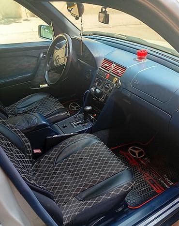 0pel astra 1.6: Mercedes-Benz C 180: 1.8 l | 1995 il Sedan — 4