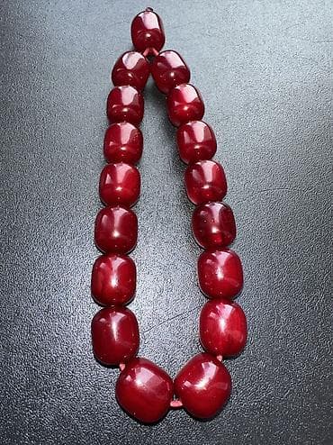 kehraba tesbeh satisi: Yüksək keyfiyyətli,cəlbedici vişnə rəng Sıxma kəhraba satılır.Təsbeh — 3