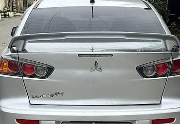 kia optima diffuser: Mitsubishi 2010 il, Orijinal — 1