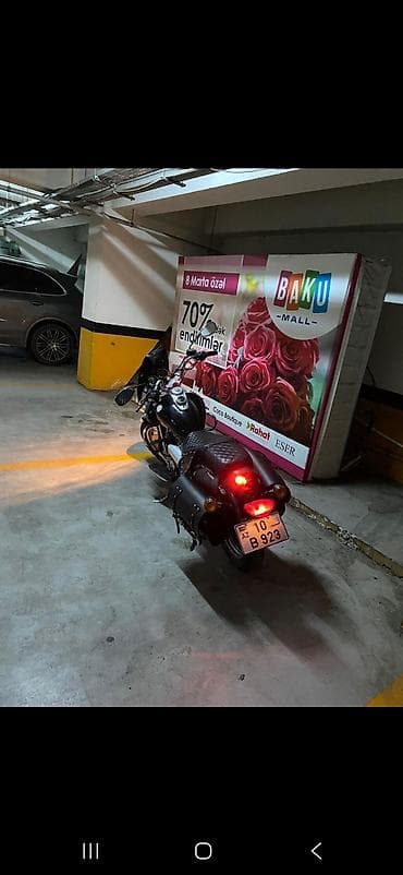 Motosiklet – kruizer tipli, qara rəng. Xüsusiyyətlər və təchizat: -