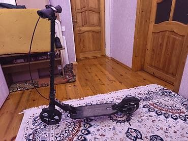 Dəbilqələr: Şəhər nəqliyyatı üçün yığcam və praktik kick skuter. Xüsusiyyətlər: - — 1