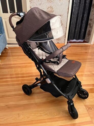 uşağ kaleskası: İki tutacaqlı araba, Kidilo, Cins: Oğlan — 1