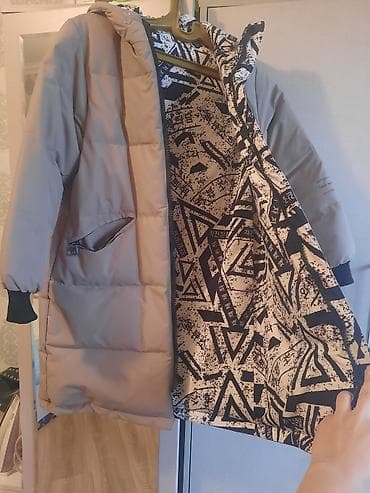 11-12 yaŝ oglan uŝaqlarina kurtka geyinilmis.iki uzlu — 1