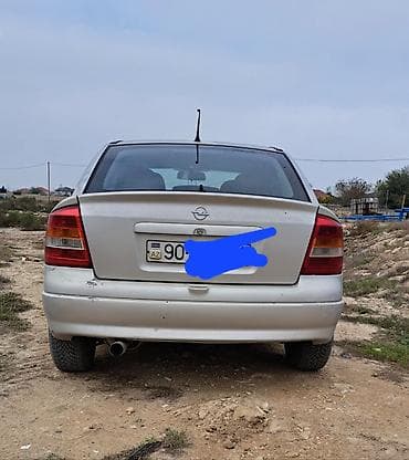 opel vektra 1995: Opel Astra G sedan/hetçbek, gümüşü rəng. - Mühərrik: ECOTEC benzin, 4 — 2