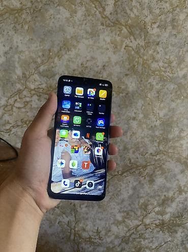 Мобильные телефоны и аксессуары: Redmi 11, 128 ГБ, цвет - Голубой, Отпечаток пальца, Две SIM карты, Face ID — 1