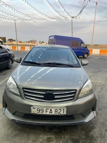 kia seed 2014: Boz rəngdə olan bu avtomobil rahat idarəetmə və funksionallıq təklif — 1