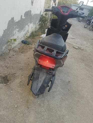mopet elektrik: Moped qeza olunub qabag plasmaslari ezilib yanlari cizilib ama tok — 3