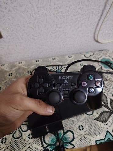 iphone 15 pro max çakma: Sony PlayStation 2 Slim oyun konsolu - Model: PS2 Slim (SCPH — 3