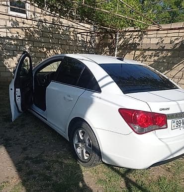 mini cooper 2009: Chevrolet Cruze: 1.4 l | 2011 il 231980 km — 6