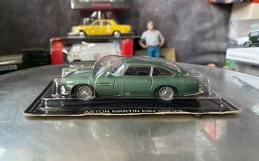Avtomobil modelləri: Коллекционная модель Aston Martin DB4 Coupe British racing green — 10