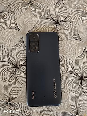 bisirme paneli: Redmi smartfon - Model: Redmi (arka qapaqda loqo). - Rəng: qara, mat — 1