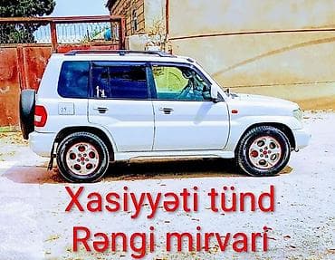 lexus 5 7: Ağ mirvari rəngli kompakt yolsuzluq avtomobili (5 qapılı, sərt — 3