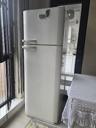 mikrafonlarin satisi: İki qapılı soyuducu (yuxarıda dondurucu) Xüsusiyyətlər: - Klassik ağ — 2