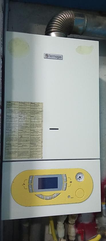 divar panelləri: İşlənmiş Kombi Termogas 24 kVt, Ünvandan götürmə, Kredit yoxdur — 1