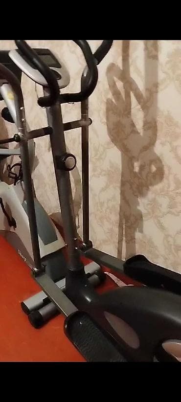 Sharp firmasının elliptik trenajoru. Evdə idman etmək üçün