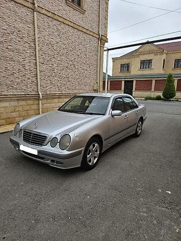 bmw e39 2003: Mercedes-Benz E 220: 2.2 l | 2001 il Sedan — 8