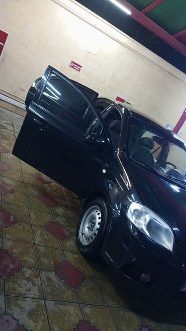 телефон держатель для автомобиля: Chevrolet Aveo: 1.4 л | 2010 г. 200 км Седан — 1