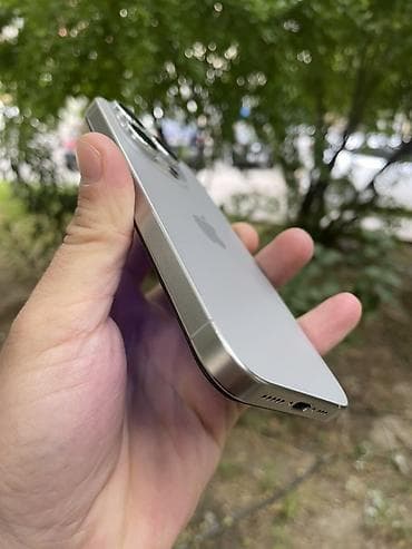 qulaqcıq iphone: IPhone 15 Pro, 128 GB, Gümüşü, Face ID — 6