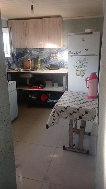 torpaq ev: Suraxini qes Tosoil yanacaq doldurma mendeqesine ayani Oajarninin — 2