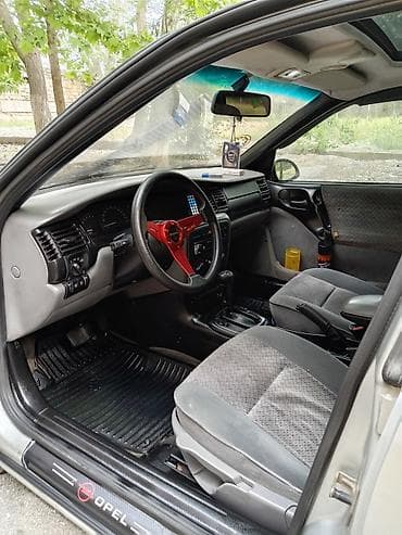 prius qapi: Opel Vectra: 1.8 l | 1997 il 541000 km Sedan — 8