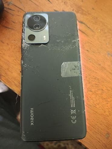 telefon satişi: Xiaomi 13 Lite, 256 GB, rəng - Qara, 
 Qırıq — 2