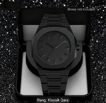 luc saatı: Minimalist dizayna malik klassik qara rəngli qol saatı. - Tam qara — 1