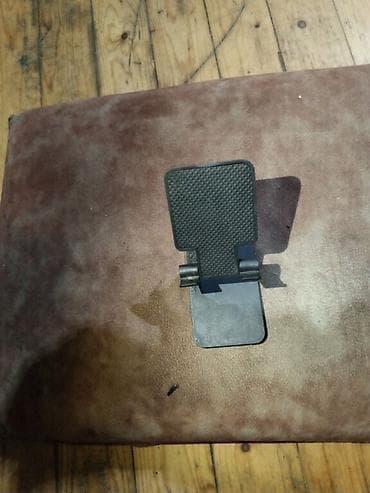 Başlıq: 1₼ telefon podstavkası Təsvir: - Yığcam və qatlanan telefon