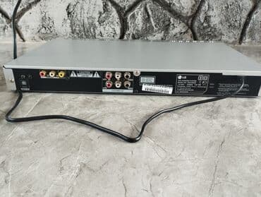 Qulaqcıqlar: LG DVD Karaoke sistemi Xüsusiyyətlər: - Model: LG DVD Karaoke System — 4