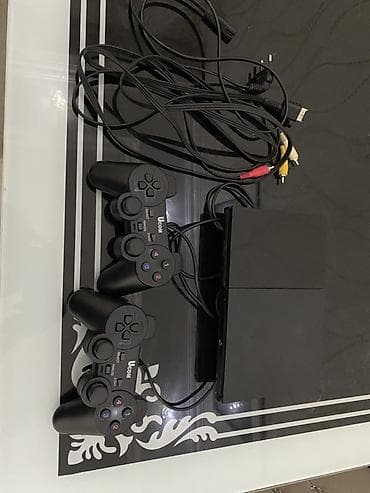 PlayStation 2 Slim oyun konsolu komplekti Xüsusiyyətlər: - Model: PS2