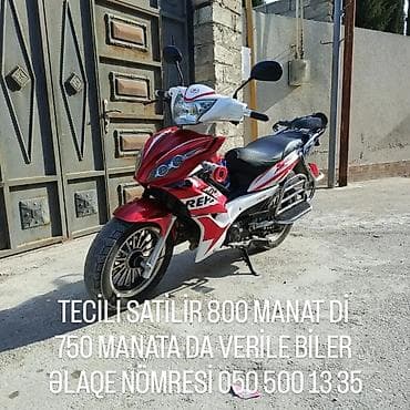 Model: REX (skuter) Rəng: qırmızı-ağ qrafika Göstərici: 34 779,5 km — 3