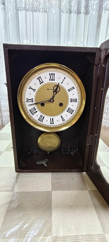 islenmis generator satisi: Divar saatları, Mexaniki, Mayatnik — 9