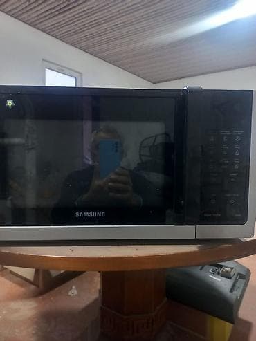 Mikrodalğalı soba Samsung, Ayrıca dayanan, Mikrodalğalar ilə, rəng - Qara, İşlənmiş