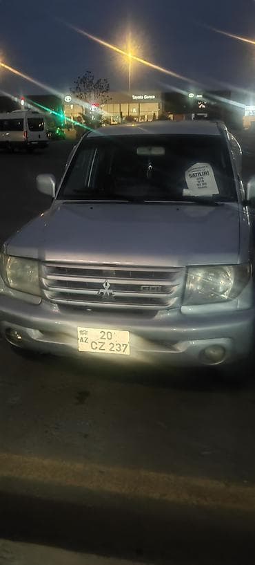 moto debilqe: Mitsubishi Pajero iO (GDI) – kompakt 4x4 krossover/SUV - Gümüşü rəng — 1
