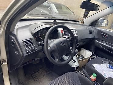 Hyundai: Hyundai Tucson: 2 l | 2009 il Krossover — 6