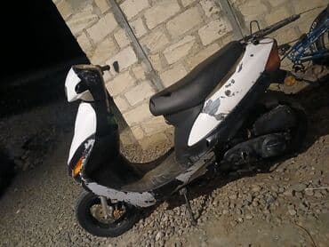 сколько стоит мопед: Şəhər içi sürüş üçün praktik skuter - Korpus: ağ-qara plastik — 1