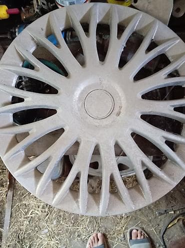 su masini satisi: Niva ucun disk qarpaglari - Ölçü: təxmini 15 düym - Material — 2