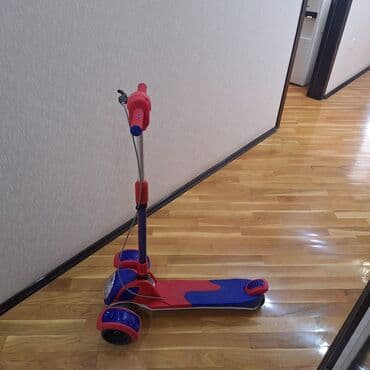 детский мотоцикл каталка: Uşaq skuterı – 3 təkərli, qırmızı-mavi rəngdə Xüsusiyyətlər: - Üç — 2