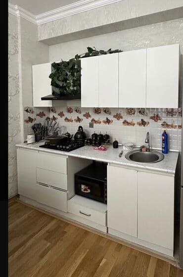 Mətbəx mebeli satılır 250₼. Yaxşı vəziyyətdədir. Ölçü 2.43. Üzərində