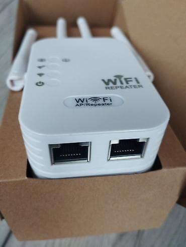 Modemlər və şəbəkə avadanlıqları: Wi‑Fi Repeater / AP gücləndirici Xüsusiyyətlər: - 4 antenalı dizayn – — 2