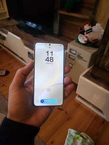 tikanlı tel: Samsung Galaxy S24, 128 GB, rəng - Bej, Simsiz şarj — 7