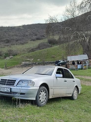 hyundai coupe satilir: Mercedes-Benz C-Class sedan (W202), gümüş rəng. - Kuzov: 4 qapılı — 4
