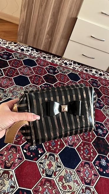 Əl çantası, Yeni