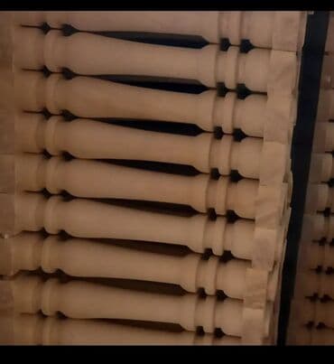 балясины из камня: Ağ rəngli, müxtəlif formalı və ölçülü dəmir-beton sütunlar. Bu — 8