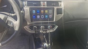 Nəqliyyat: Kia Rio: 1.4 l | 2014 il Sedan — 5