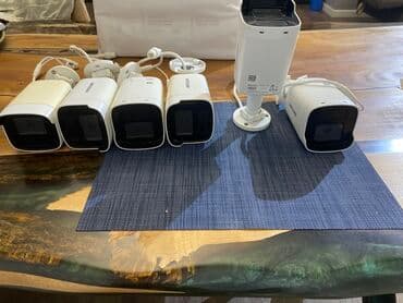 mini gizli kamera kablosuz: Ağ rəngdə Hikvision şəbəkə kamerası. Bu kamera dəsti ev, ofis və ya — 2