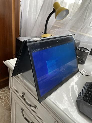 dinamik pioner: Lenovo ThinkPad Yoga seriyalı 2‑in‑1 noutbuk Xüsusiyyətlər: - 14" — 3
